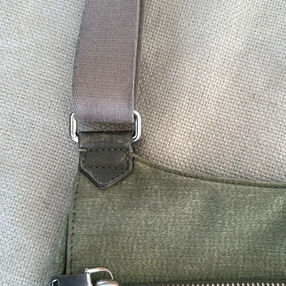 Kipling moss green with colbalt blue lining crossbody bag